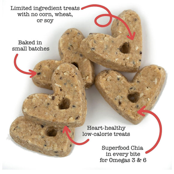 Heart-shaped dog treats with text highlighting features on a white background