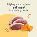 Meat and carrots with text 'High quality protein real meat in a savory broth' on a beige background