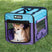 Pet carrier with a dog inside on a grassy background, featuring the Guardian Gear brand.