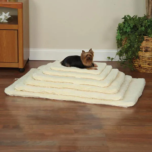 Dog lying on a plush, multi-level pet bed in a home setting.