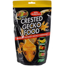Zoo Med Crested Gecko Food packaging with a black background and yellow top.
