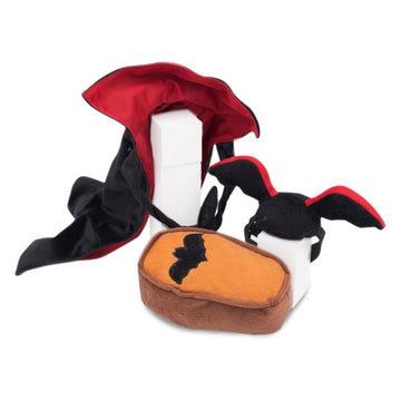 Plush toy resembling a character with a red hood, black wings, and orange base on a white background