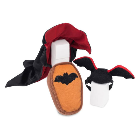 Halloween-themed slippers with bat design on a white background