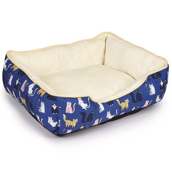 Pet bed with cat pattern on a blue background