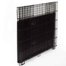 Black metal pet crate on a white background