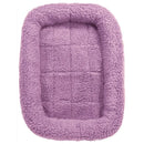 Purple pet bed with a textured surface on a white background