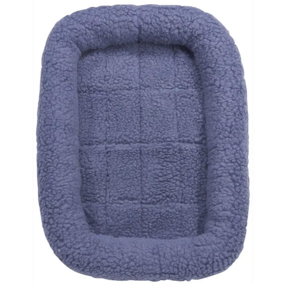 Blue pet bed with a textured surface on a white background