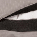 Close-up of gray fabric with black elastic band