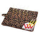 Leopard print pouch with yellow and red accents on a white background