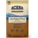 Acana dog food package with mountain and lake design on a beige background