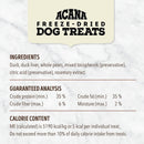 Acana freeze-dried dog treats label with ingredients, guaranteed analysis, and calorie content on a marble background.