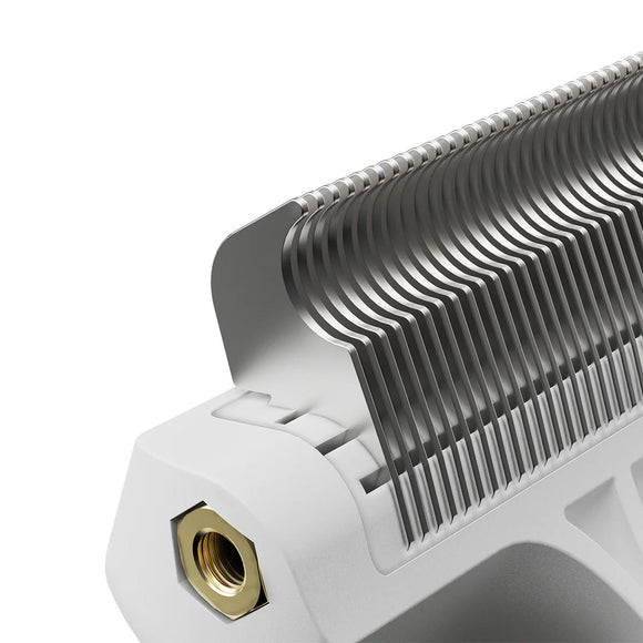 Close-up of a hair dryer nozzle with metallic finish and gold-colored fitting on a white background