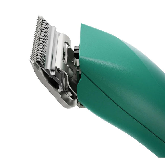 Green hair clipper with visible blade on a white background