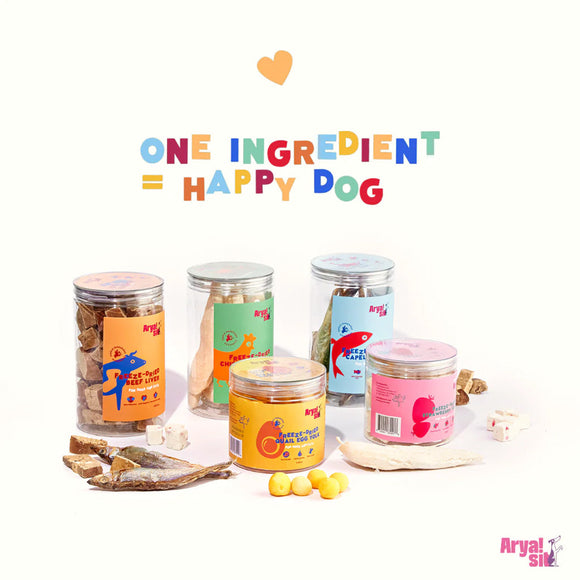 Assorted dog treats in colorful jars with 'One Ingredient = Happy Dog' text on a white background.