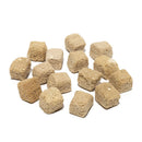 Beige sponge cubes on a white background