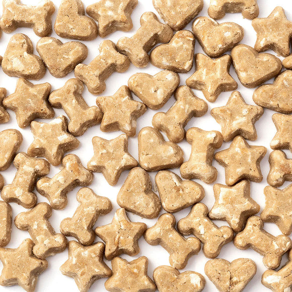 Dog treats shaped like stars and hearts on a white background