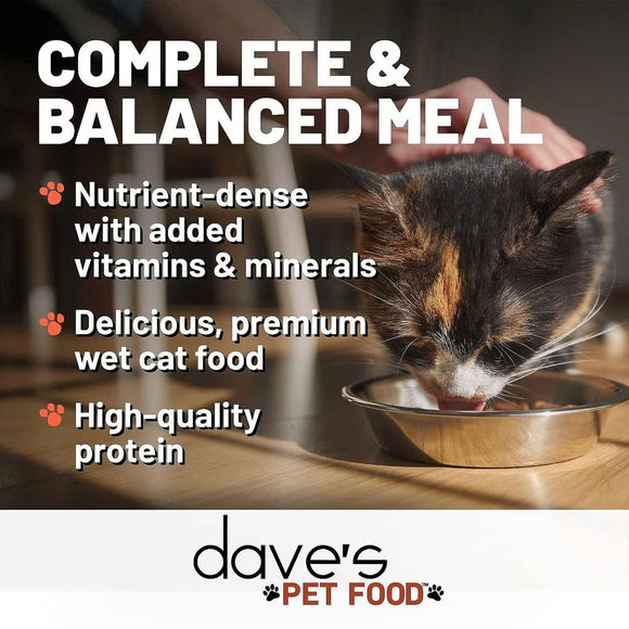 Cat drinking from a bowl with text about dave's pet food on a wooden surface.