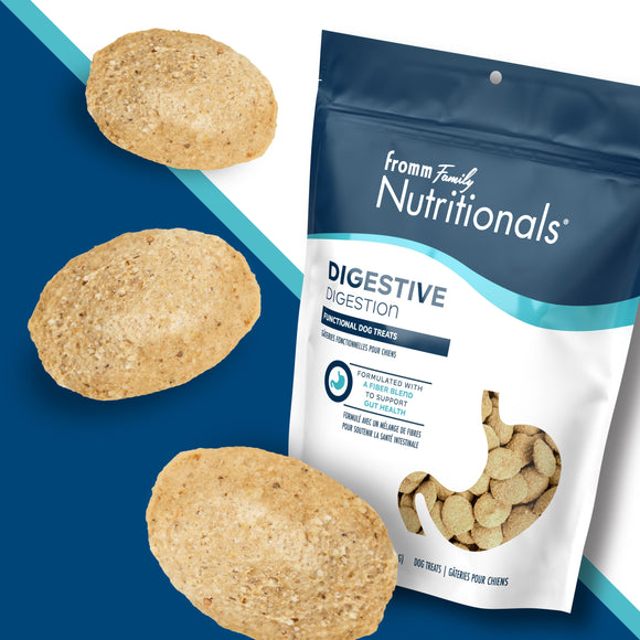 Dog treats with a 'fromm family nutritionals' package on a blue background