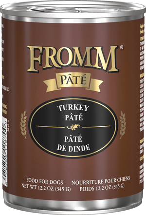 Can of Fromm Turkey Pété dog food on a black background