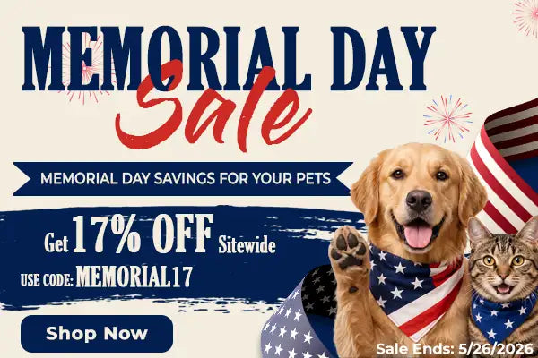 Golden retriever wearing a red, white, and blue american flag bandana.
