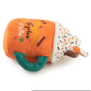 Plush toy resembling a pumpkin spice latte with sprinkles on a white background