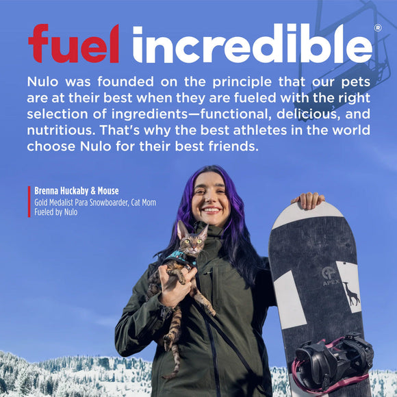 Person holding a cat and a snowboard with Nulo pet food branding and promotional text.