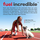 Woman in athletic gear with a dog on a track, promoting Nulo pet food.