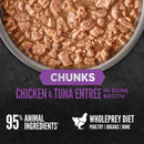 Pet food container with chicken and tuna entrée on a black background, featuring Wholeprey Diet branding.