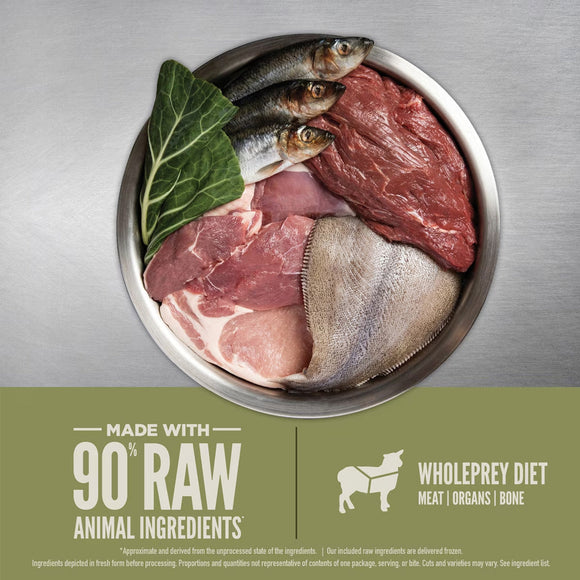 Raw meat, fish, and vegetables in a bowl with Wholeprey Diet branding.