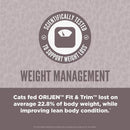 Orijen Fit & Trim weight management label on a gray background