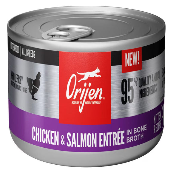 Orijen canned chicken and salmon entree for cats on a white background