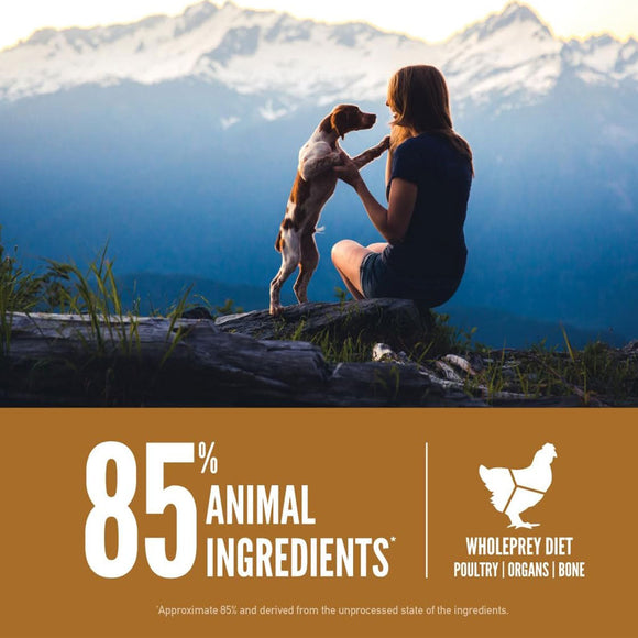 Woman sitting on a rock with a dog, mountains in the background, and text about animal ingredients.