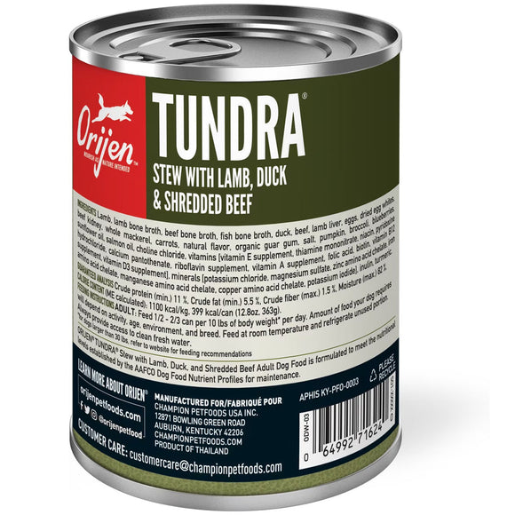 Canned dog food can with 'Tundra' label featuring Orijen branding on a white background.