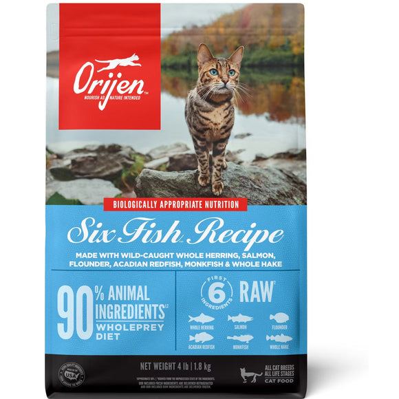 Orijen cat food package with a cat on rocks by a lake