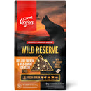 Orijen Wild Reserve cat food package with sunset design and cat silhouette