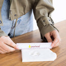 Person using a Pearhead product on a wooden surface