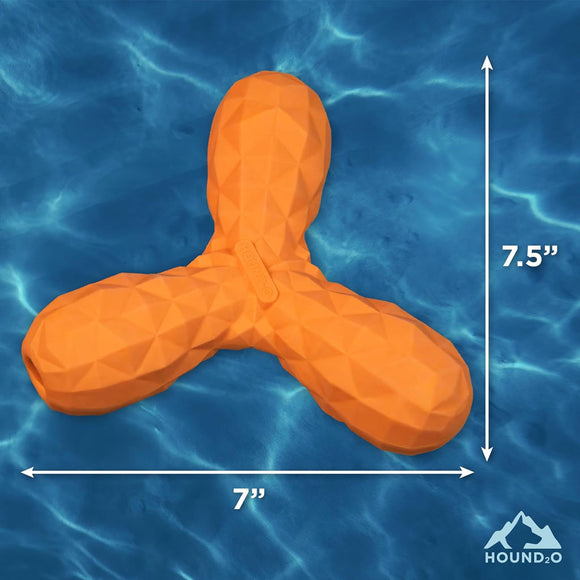 Orange dog toy with measurements on a blue water background