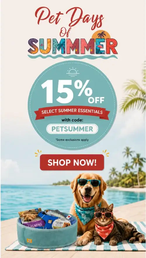 A turquoise pet bowl filled with assorted summer treats sits on a striped mat beside two pets wearing sunglasses.