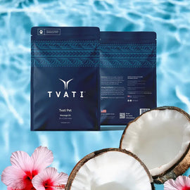 TVATI product packaging with coconuts and flowers on a blue water background