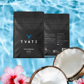 Black TVATI packaging with coconuts and flowers on a blue water background