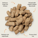 Dog food pellets with text highlighting ingredients on a light gray background