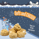 Dog treats with 'Lazy Dog' branding on a snowy background