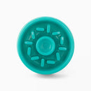 Turquoise plastic component on a white background