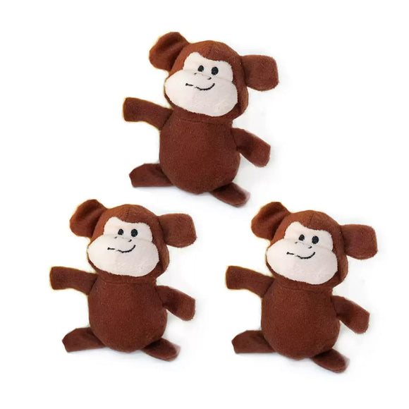Three brown monkey plush toys on a white background