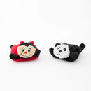Two plush toys, one resembling a ladybug and the other a panda, on a white background.