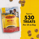 Zuke's Mini Naturals dog treat package with text on a yellow background